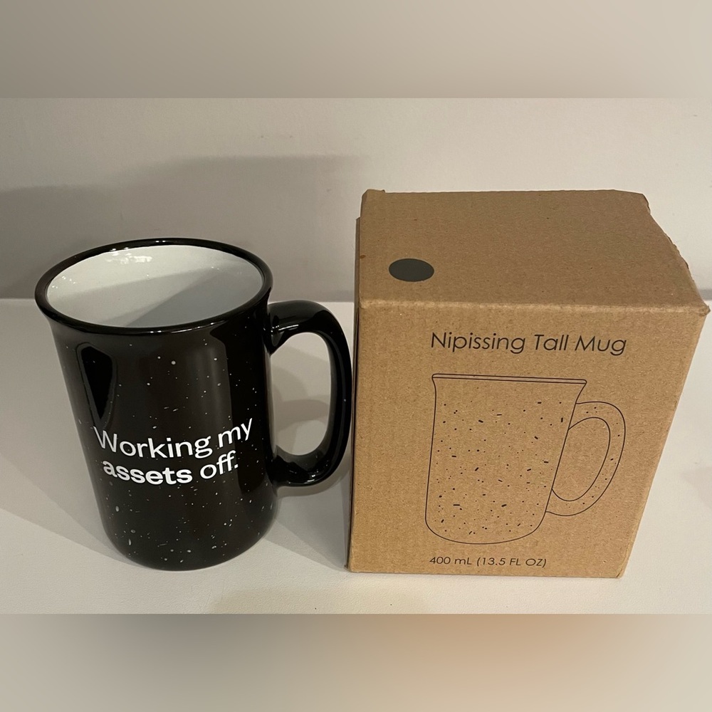 Black and White Speckled Mug saying Working my assets off.